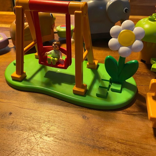Playmobil playground set with train and motorcyclist like new