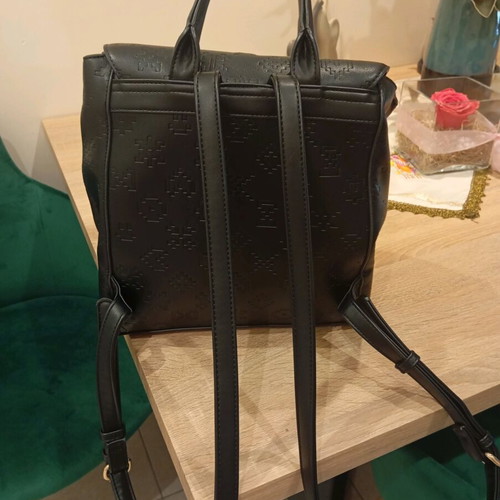 Kem backpack bag like new, black with gold details