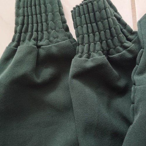 Strapless jumpsuit dark green with smocking and elastic legs, used, size S