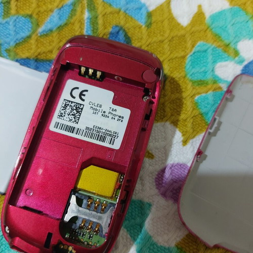 Alcatel vintage flip phone used, red, charger included