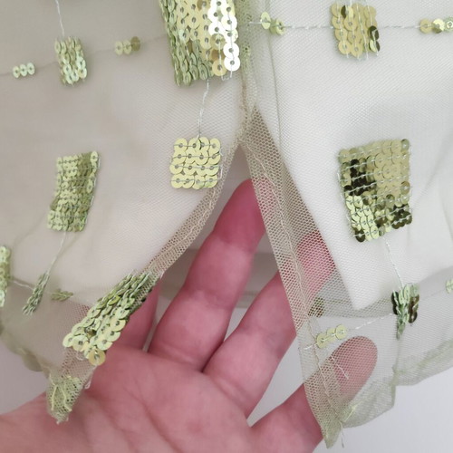 Dress green light with sequins size 48 like new