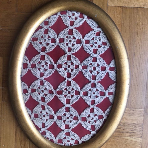 Framed artwork with gold wooden frame and glass used, handmade crochet