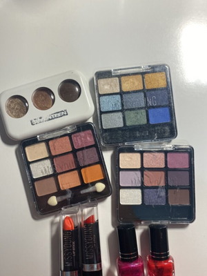 Cosmetics pack used with 4 eyeshadow palettes, 2 lipsticks, 2 nail polishes