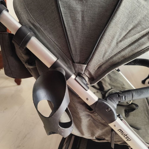 Mutsy Nexo stroller used with cup holder and organizer
