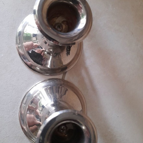 Silver candlestick set used with grape decoration
