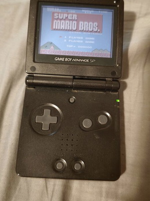 Κονσόλα Gameboy Advance SP με 8 κασέτες παιχνιδιών