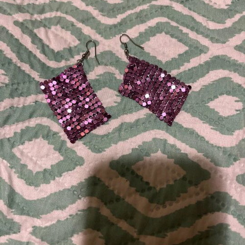 Purple earrings hanging like new