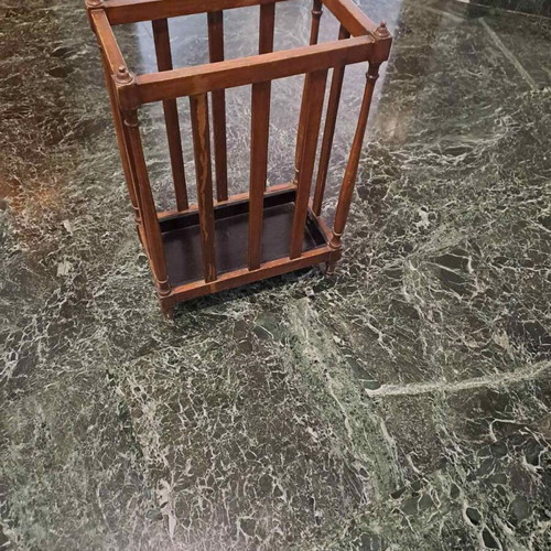 Vintage wooden umbrella stand used for hallway