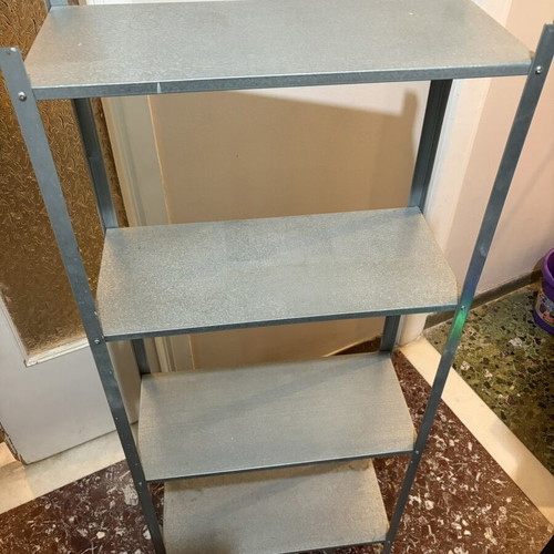 Metal storage shelf 4 levels like new