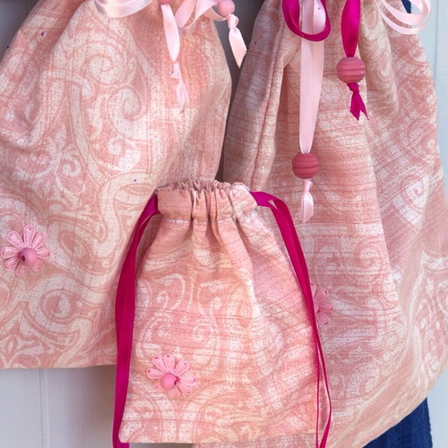 Set of three handmade pink pouches new, cotton with wooden beads