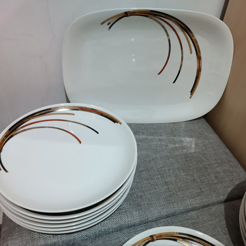 Porcelain dinnerware set with 6 dinner, 6 soup, 6 fruit plates and large serving platter