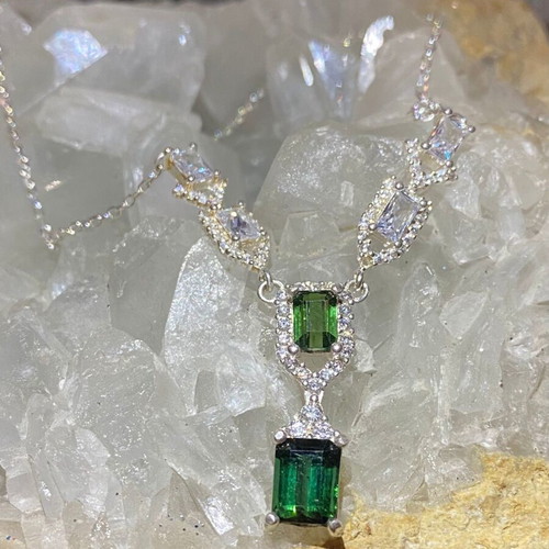 Silver necklace with natural indicolite, green tourmaline, topaz and moissanite