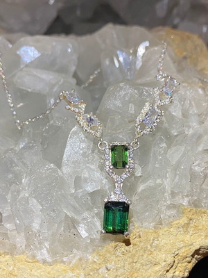 Silver necklace with natural indicolite, green tourmaline, topaz and moissanite