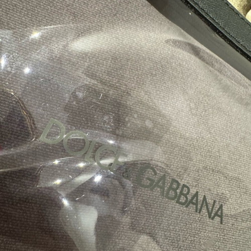 Dolce & Gabbana transparent pouch like new, black PVC with leather trim