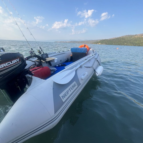 Neptune 330 inflatable boat with Mercury 9.9 outboard motor