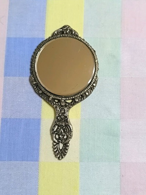 Vintage hand mirror used