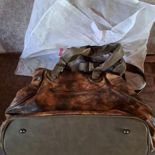 Doca shoulder bag dark color like new