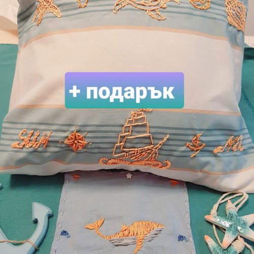 Decorative pillow with golden hand embroidery and sea motifs, new