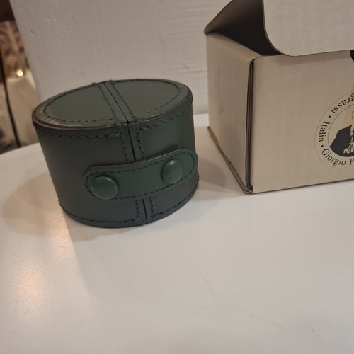 Cylindrical leather vintage travel case with small clock by Giorgio Pizzitutti