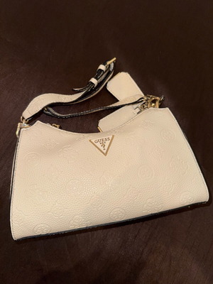 Guess white shoulder bag used with embossed logo pattern