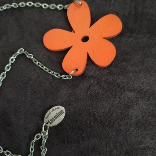 Long necklace with orange wooden daisies and silver chain like new