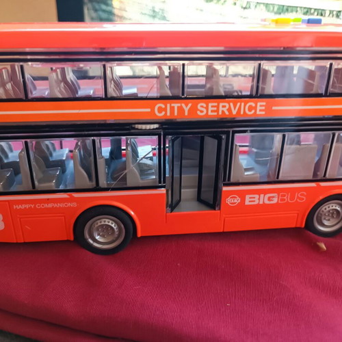 Toy bus used with lights and sounds