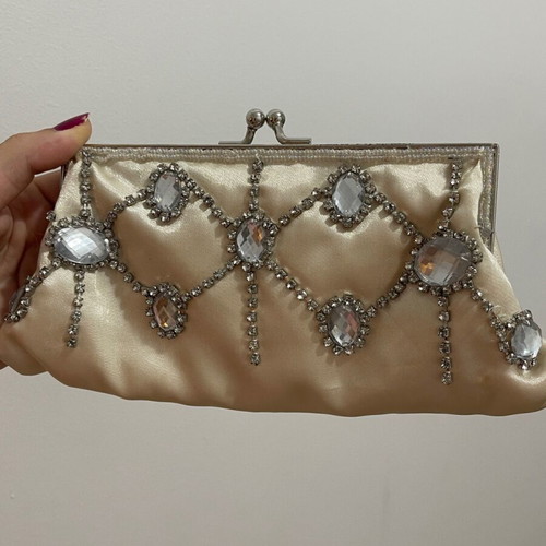 Clutch golden like new with long straps