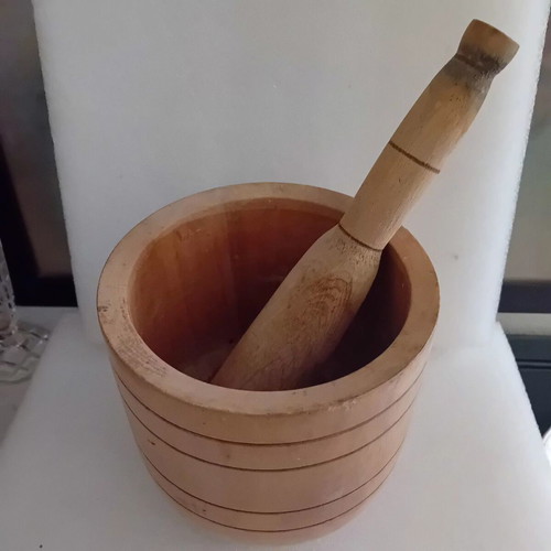 Large wooden vintage mortar and pestle