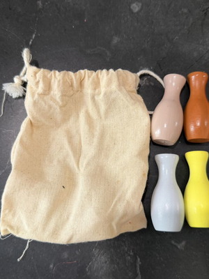 Mini wooden bowling pins, ball missing