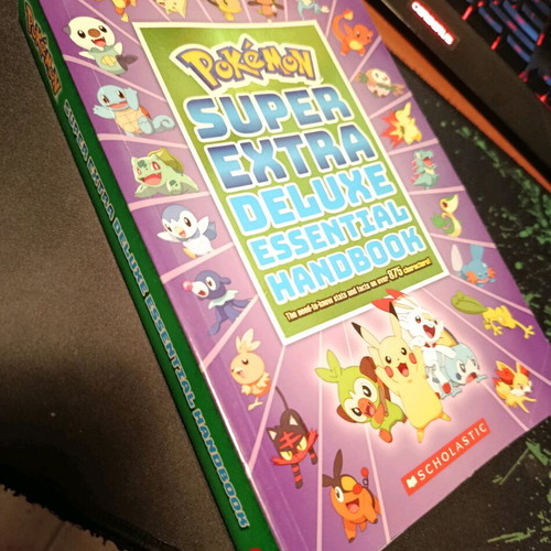 Pokémon Super Extra Deluxe Essential Handbook used, English