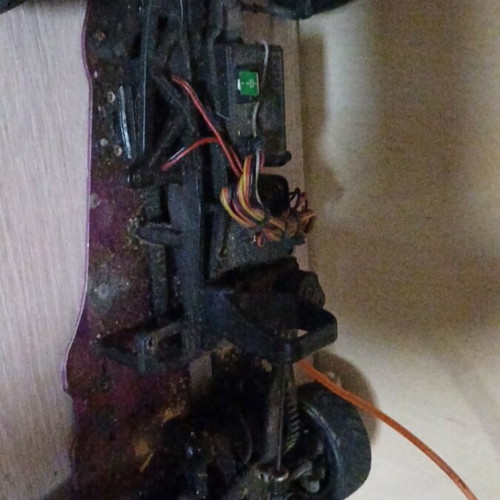 HPI gas-powered remote control car with spare parts