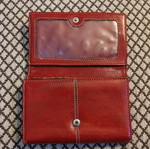 Red wallet used with multiple compartments
