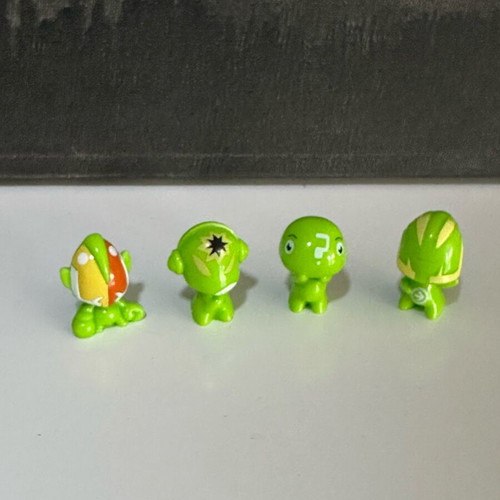 Go-Go’s Crazy Bones neon green mini figures like new collectible set