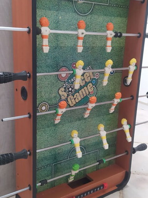 Table football used, missing ball, functional