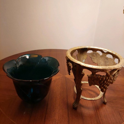 Vintage glass petrol planter with metal base like new