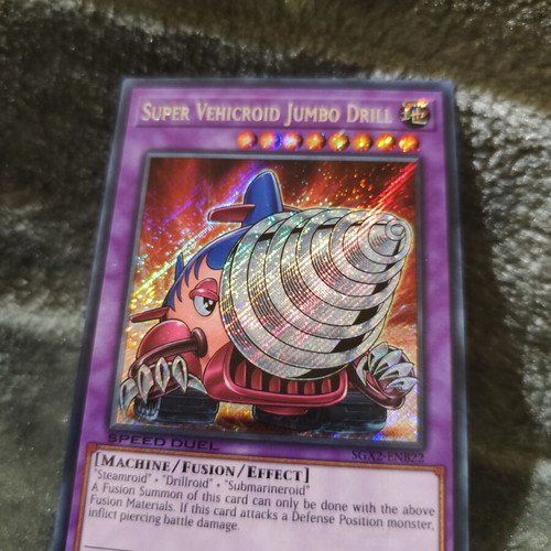 Super Vehicroid Jumbo Drill Yu-Gi-Oh! card new, Secret Rare