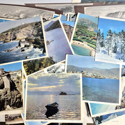 Large collection of vintage posters, calendars and photos used