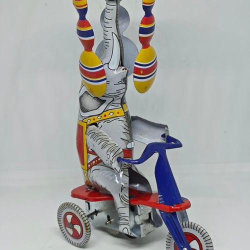 Vintage metal elephant on tricycle like new