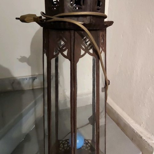 Metal vintage decorative garden lantern used with blue lighting