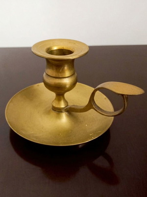 Vintage brass candle holder used, classic decoration