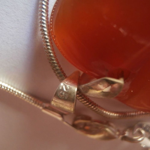 Baltic amber necklace with leaf pendant