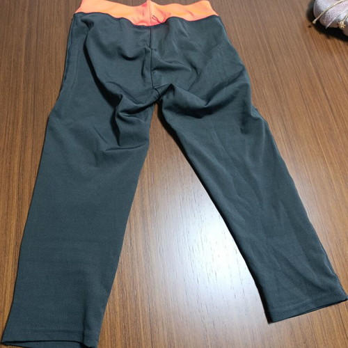 Women's 3/4 leggings anthracite with orange details used, size M