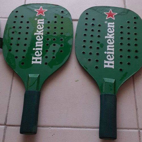 Heineken wooden rackets with plastic case like new