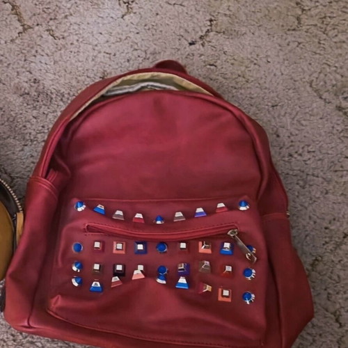 Backpack red like new with studs