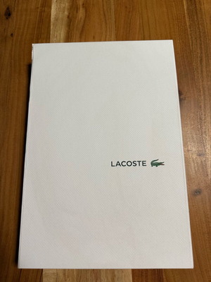 Lacoste storage box like new for tshirts or belts, jewelry