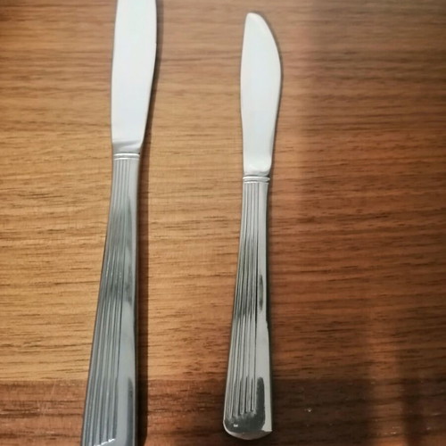 Inox knife set of 8 unused, 4 large and 4 small