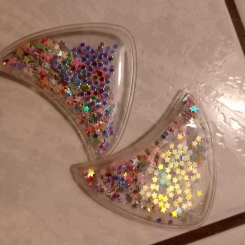 Plastic ears with stars like new