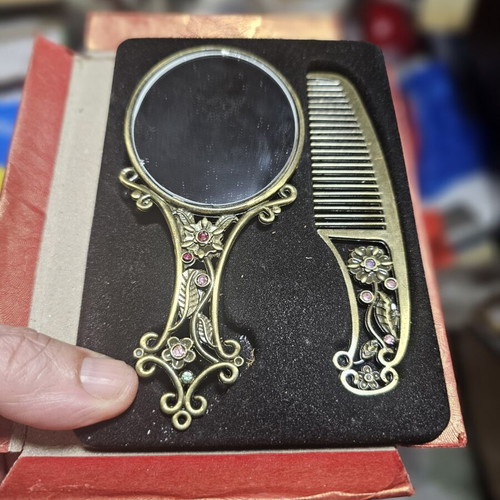 Vintage mirror and comb set