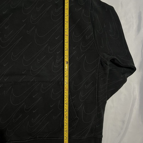 Nike black hoodie with Swoosh pattern, medium
