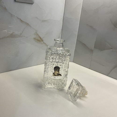 Vintage crystal decanter 1960–1970 with silver classical medal and stopper